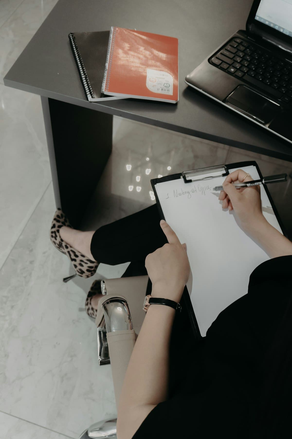 Clinician drafting a comprehensive clinical evaluation report